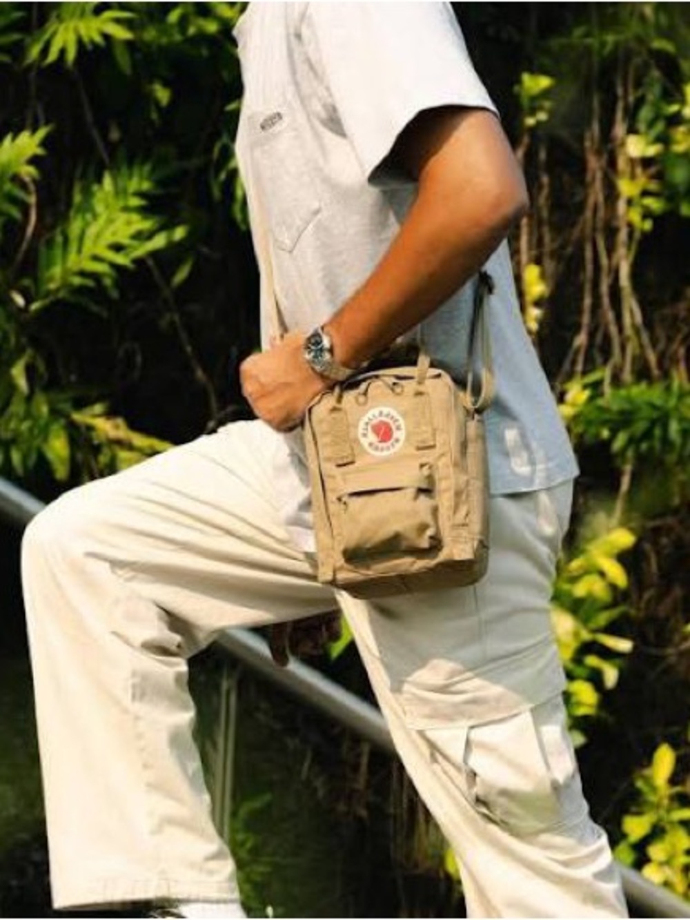 KÅNKEN SLING EVERYDAY OUTDOOR Mini Crossbody Bag - Tan 8.5”x7.5”
“Sep 026”